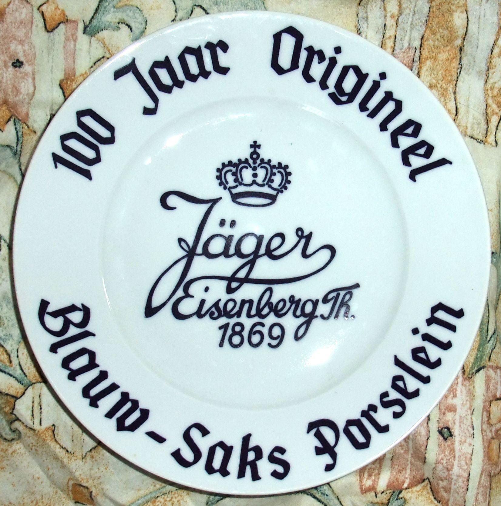 Teller zum Aufstellen für niederländische Händler, um 1990: Officieel Dealer Jäger Eisenberg seit 1869 Original BLAU SAKS.